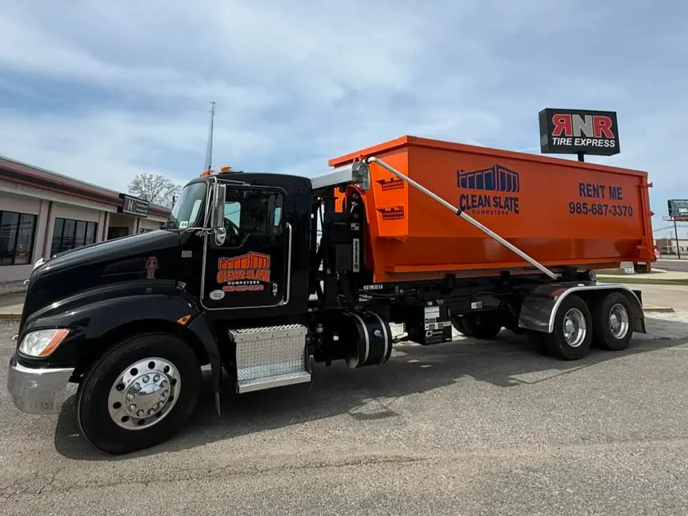 clean slate dumpsters roll off truck orange container