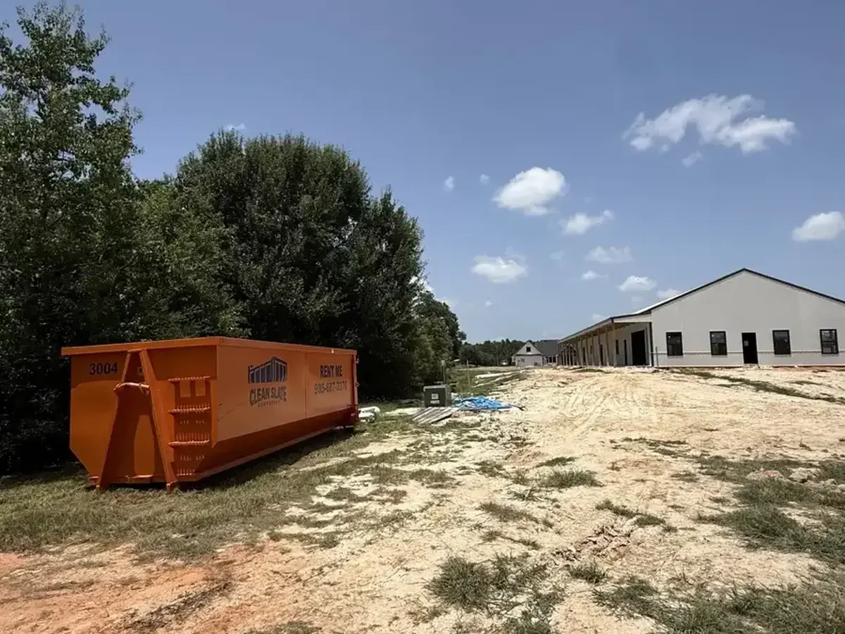 dumpster dirt lot demolition building site