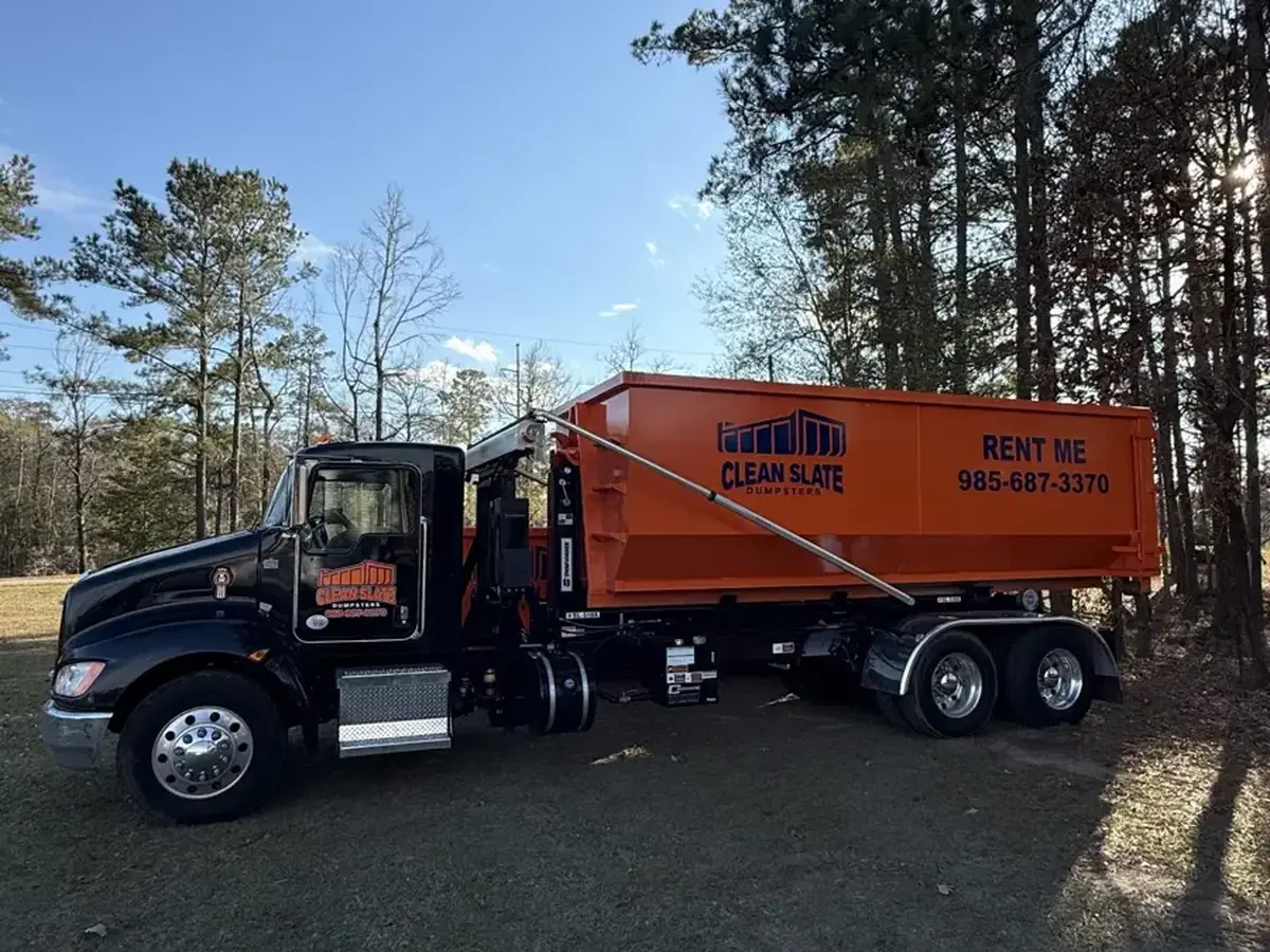 dumpster truck delivery side view