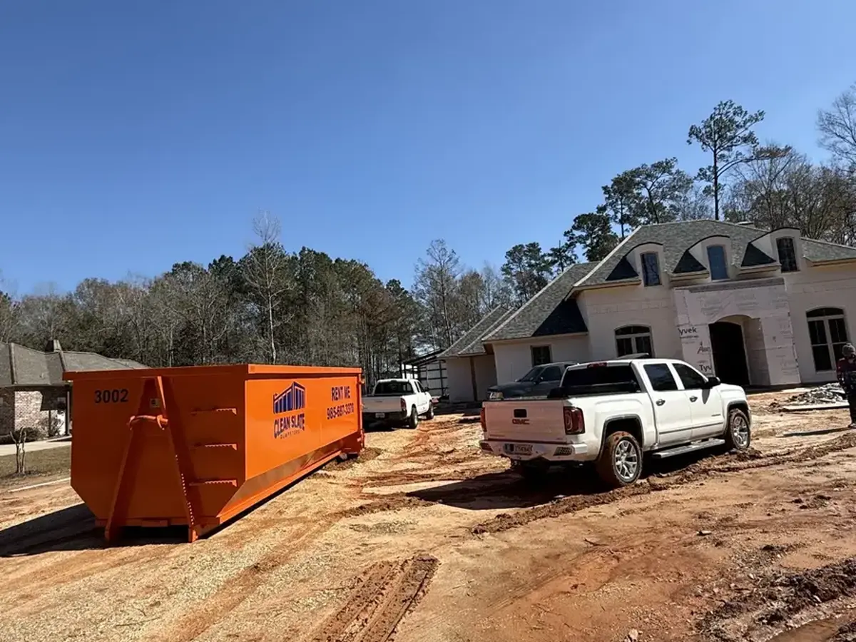 dumpster truck dirt road demolition site